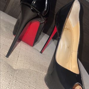 Christian Louboutin black platform heels aka authentic “Red Bottoms”